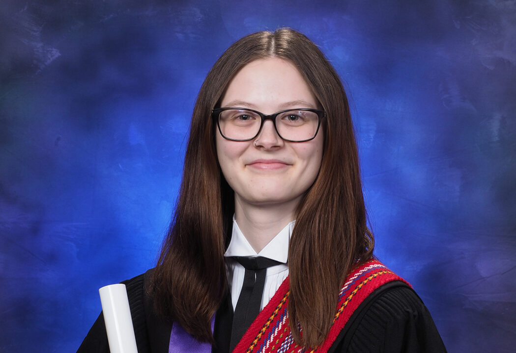 Kaitlyn in convocation gown